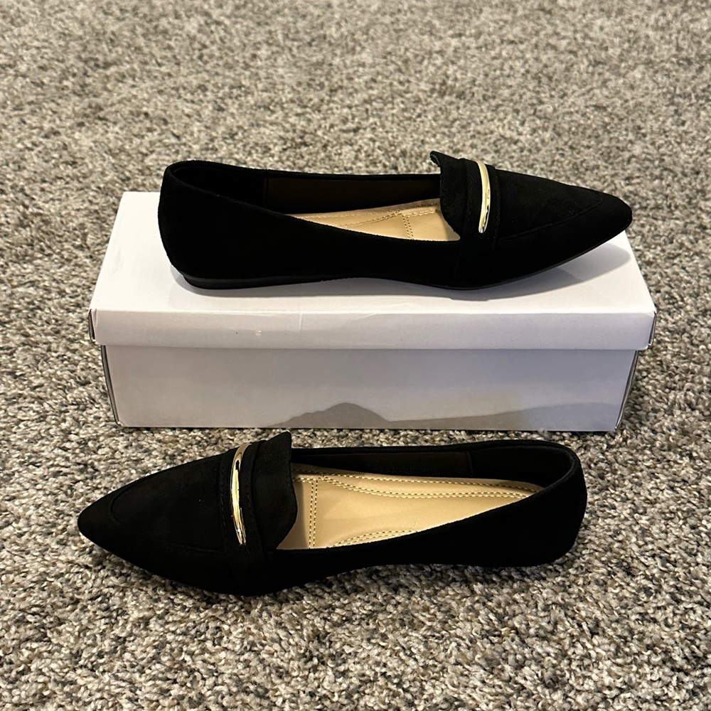 Black point toed loafers